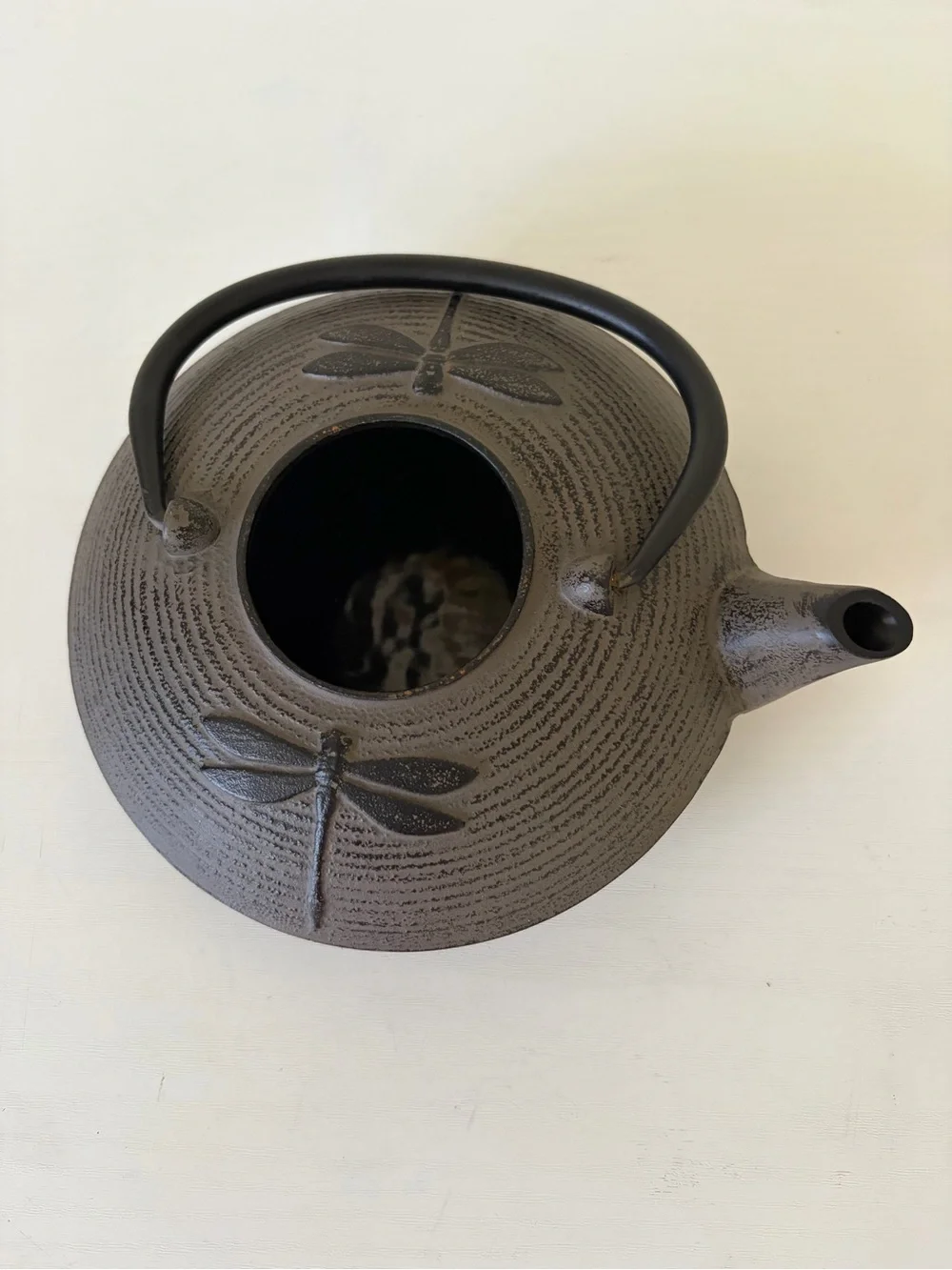 Black Cast Iron Dragonfly Motif Teapot with Curved Handle